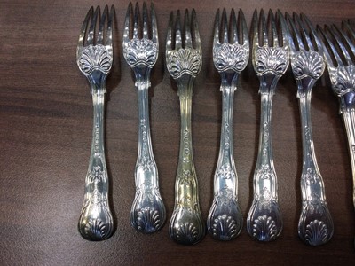 Lot 496 - A COMPOSITE SET OF TWELVE 19TH CENTURY SILVER KING'S PATTERN TABLE FORKS