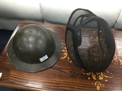 Lot 504 - A WWII BRITISH HELMET AND A FENCING MASK