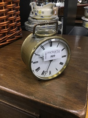 Lot 509 - AN EARLY 20TH CENTURY BRASS ALARM CLOCK AND A STAINLEES STEEL MODEL YACHT