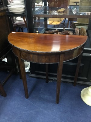 Lot 522 - A MAHOGANY DEMI LUNE TEA TABLE