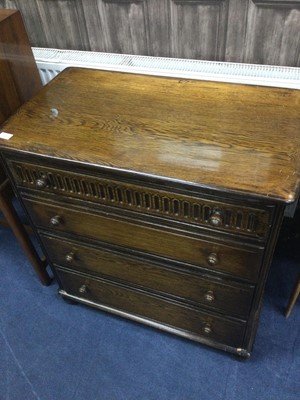 Lot 523 - AN OAK CHEST OF FOUR DRAWERS