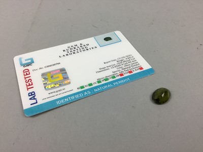 Lot 60A - **CERTIFICATED UNMOUNTED PERIDOT, oval mixed...