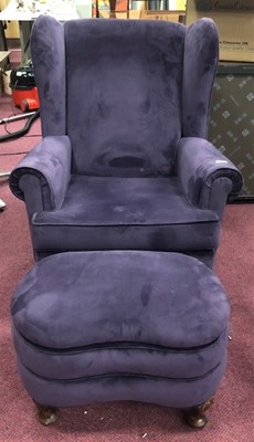 Lot 540 - A WINGBACK CHAIR AND STOOL