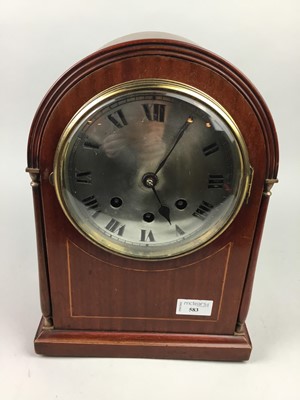 Lot 583 - A 20TH CENTURY MAHOGANY DOME CASED MANTEL CLOCK