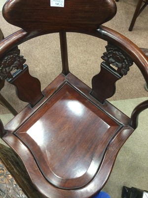 Lot 745 - A PAIR OF CHINESE HARDWOOD CORNER CHAIRS AND A TWO TIER TABLE