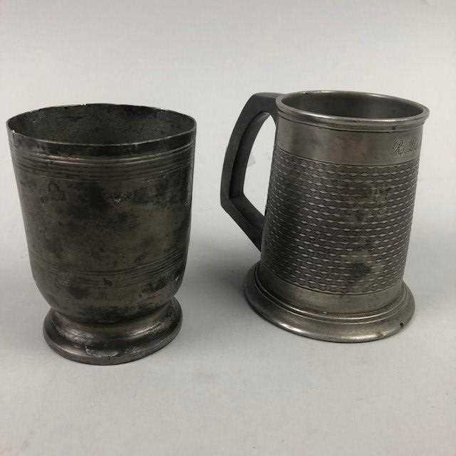 Lot 28 - A GEORGIAN PEWTER MEASURE AND A TANKARD