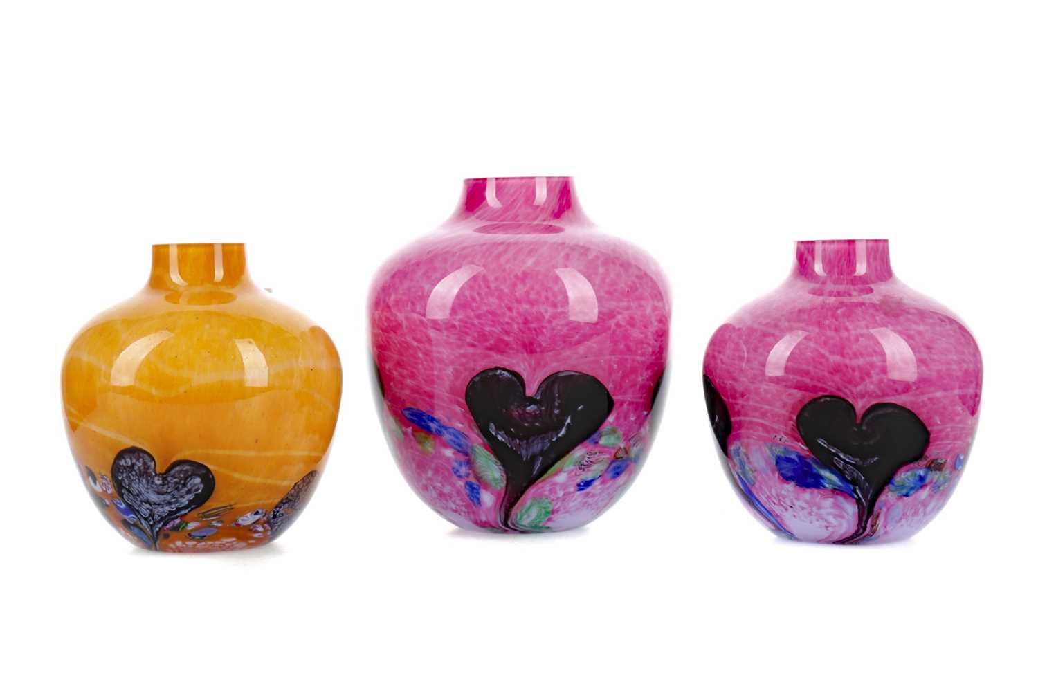 Lot 1019 - A COLLECTION OF FIVE CAITHNESS COLOURED GLASS VASES