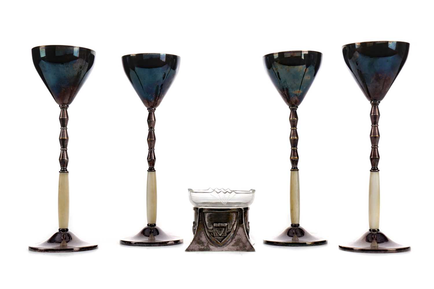 Lot 403 - SET OF FOUR EARLY 20TH CENTURY WMF SILVER PLATED LIQUEUR GLASSES, ALONG WITH AN OPEN SALT