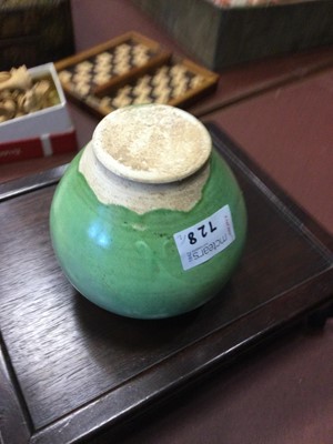Lot 728 - A CHINESE GREEN GLAZED POTTERY JAR AND A STRAW GLAZED JAR