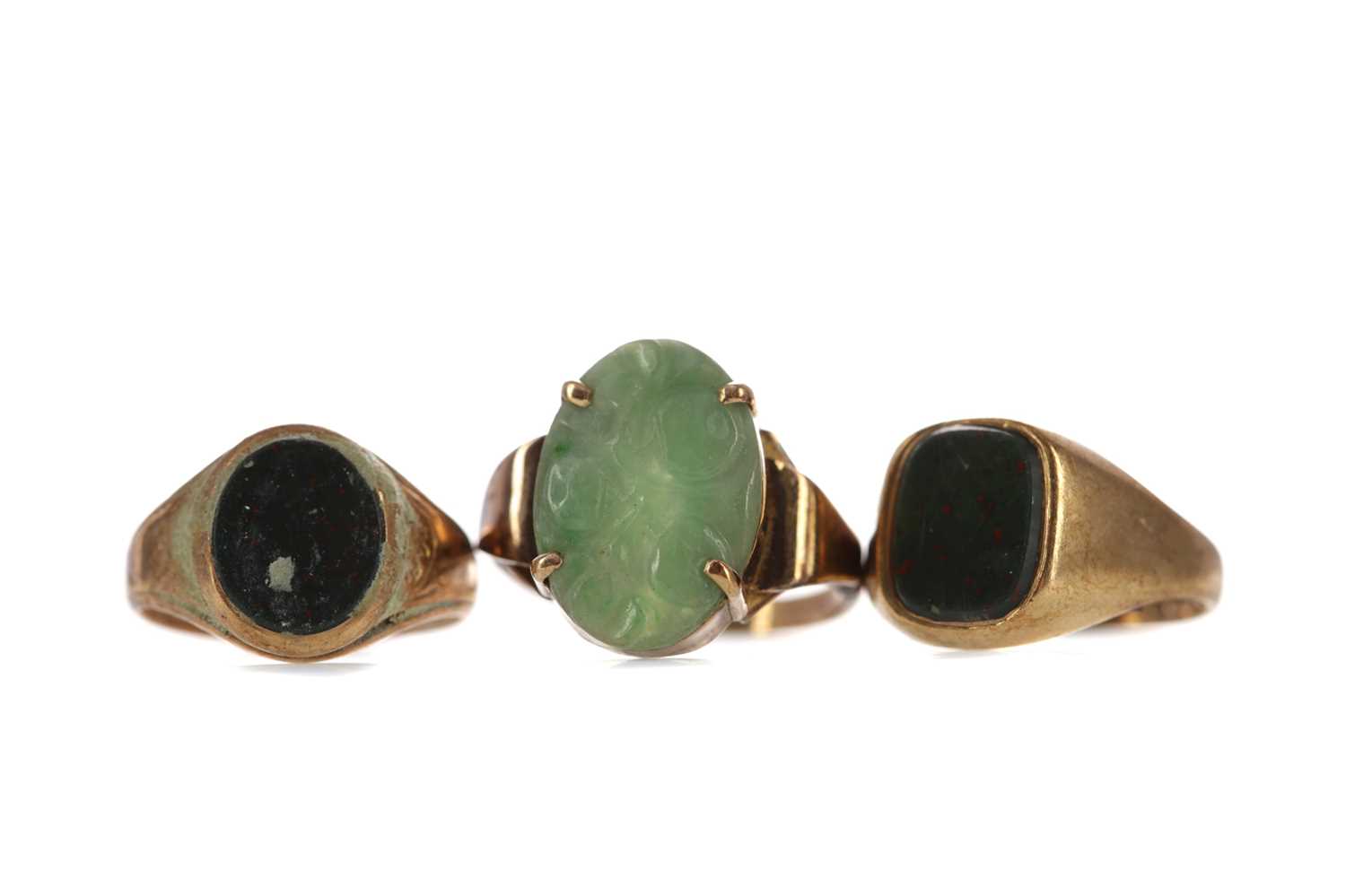 Lot 1383 - TWO BLOODSTONE AGATE RINGS AND A GREEN HARDSTONE RING