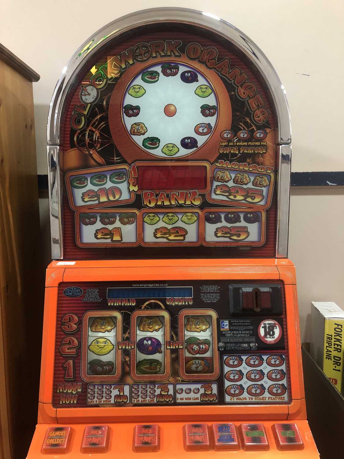 Lot 122 - A CASINO MODEL, DOME TOPPED 'CLOCKWORK ORANGES' £35 JACKPOT FRUIT MACHINE