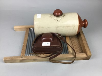 Lot 161 - AN OAK CASED MANTEL CLOCK, AN ILFPORD CAMERA, WASHBOARD AND A STONEWARE BOTTLE