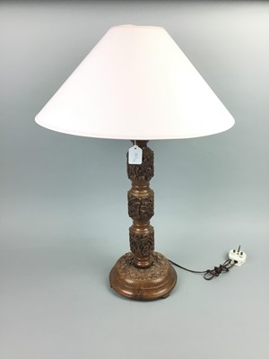 Lot 151 - A CHINESE HARDWOOD FIGURAL TABLE LAMP AND ANOTHER LAMP