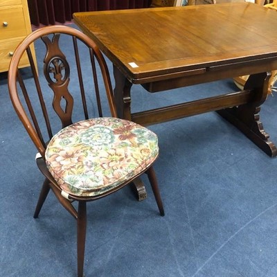 Lot 132 - AN OAK EXTENDING DINING TABLE AND FOUR ERCOL CHAIRS