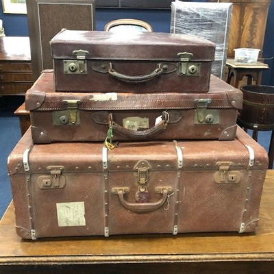 Lot 173 - A VINTAGE LEATHER TRAVEL TRUNK AND TWO SUITCASES