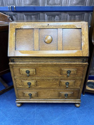 Lot 220 - AN OAK BUREAU