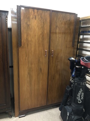 Lot 217 - A WALNUT TWO DOOR WARDROBE