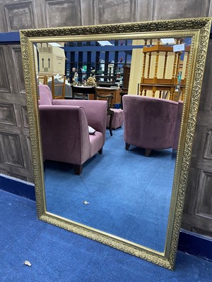 Lot 234 - A MODERN GILT FRAMED WALL MIRROR