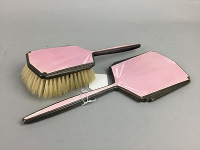 Lot 2 - AN ART DECO SILVER AND PINK GUILLOCHE ENAMEL VANITY MIRROR AND BRUSH AND A CLOCK