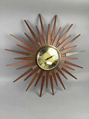 Lot 277 - AN ANSTEY & WILSON SUNBURST WALL CLOCK AND A METRONOME