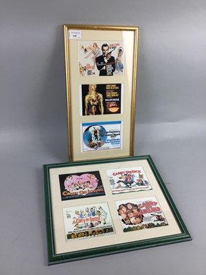 Lot 290 - A FRAMED SET OF THREE JAMES BOND POSTCARDS, ALONG WITH CARRY ON POSTCARDS