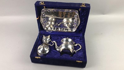 Lot 367 - A SILVER PLATED FOUR PIECE TEA SERVICE IN A FITTED BOX