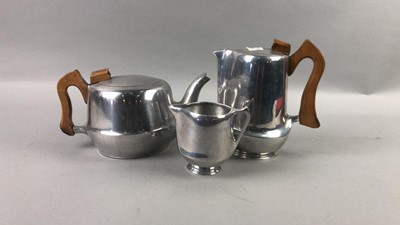 Lot 370 - A PICQUOT FOUR PIECE TEA SERVICE AND SILVER PLATED WINE SLIDES