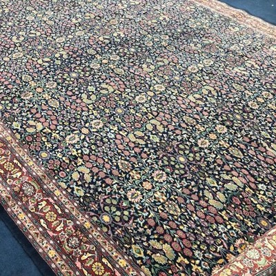 Lot 379 - A 20TH CENTURY PERSIAN STYLE CARPET