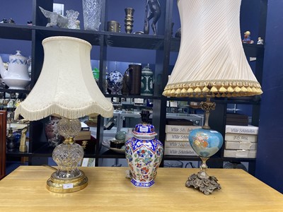 Lot 389 - A CRYSTAL AND BRASS TABLE LAMP AND TWO OTHERS