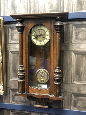 Lot 376 - A MAHOGANY WALL CLOCK