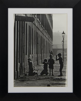 Lot 656 - CHILDREN AT PLAY, A PHOTOGRAPH BY OSCAR MARZAROLI
