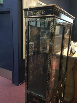 Lot 735 - A 20TH CENTURY CHINESE LACQUERED DISPLAY CABINET