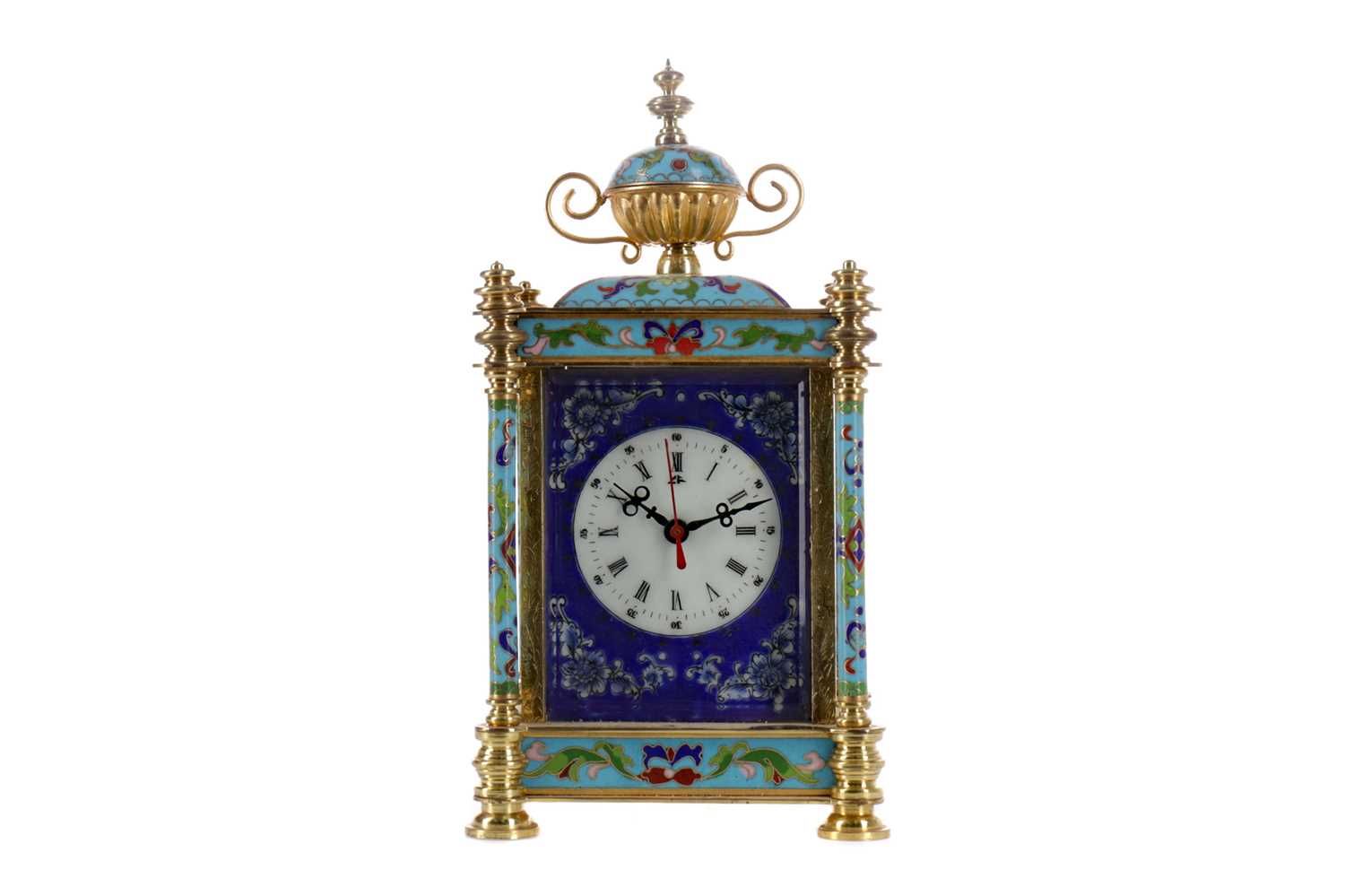 Lot 1101 - A REPRODUCTION ORMOLU AND CHAMPLEVE ENAMEL MANTEL CLOCK