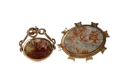 Lot 416 - AN IMPRESSIVE AGATE BROOCH AND SWIVEL FOB