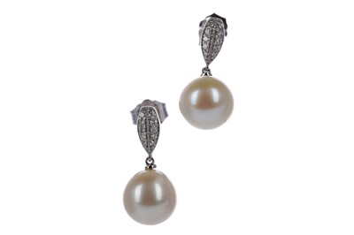 Lot 487 - A PAIR OF PEARL AND DIAMOND EARRINGS