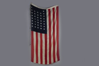 Lot 515 - A MID-20TH CENTURY AMERICAN ENSIGN FLAG