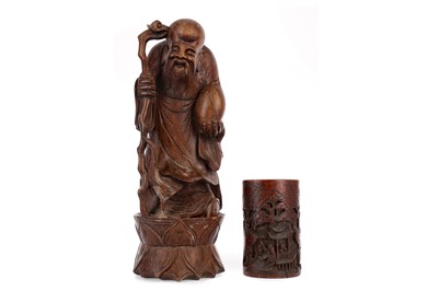 Lot 737 - A CHINESE CARVED WOOD FIGURE OF SHAO LAO AND A BRUSH POT