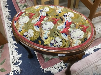 Lot 157 - AN OVAL DRESSING STOOL
