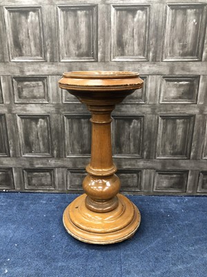 Lot 239 - A STAINED OAK FONT