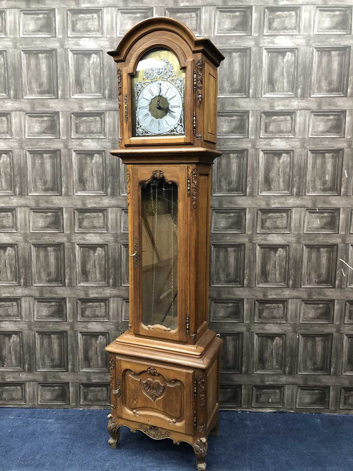 Lot 242 AN OAK GRANDFATHER CLOCK