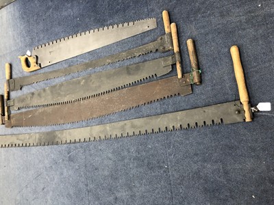 Lot 246 - A LOT OF FIVE LOG CUTTING HAND SAWS
