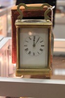 Lot 26 - LARGE BRASS CARRIAGE CLOCK The two train eight...