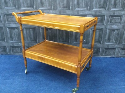 Lot 209 - A MODERN YEW WOOD TWO TIER TEA TROLLEY