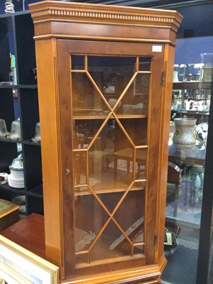 Lot 202 - A REPRODUCTION YEW WOOD CORNER CABINET