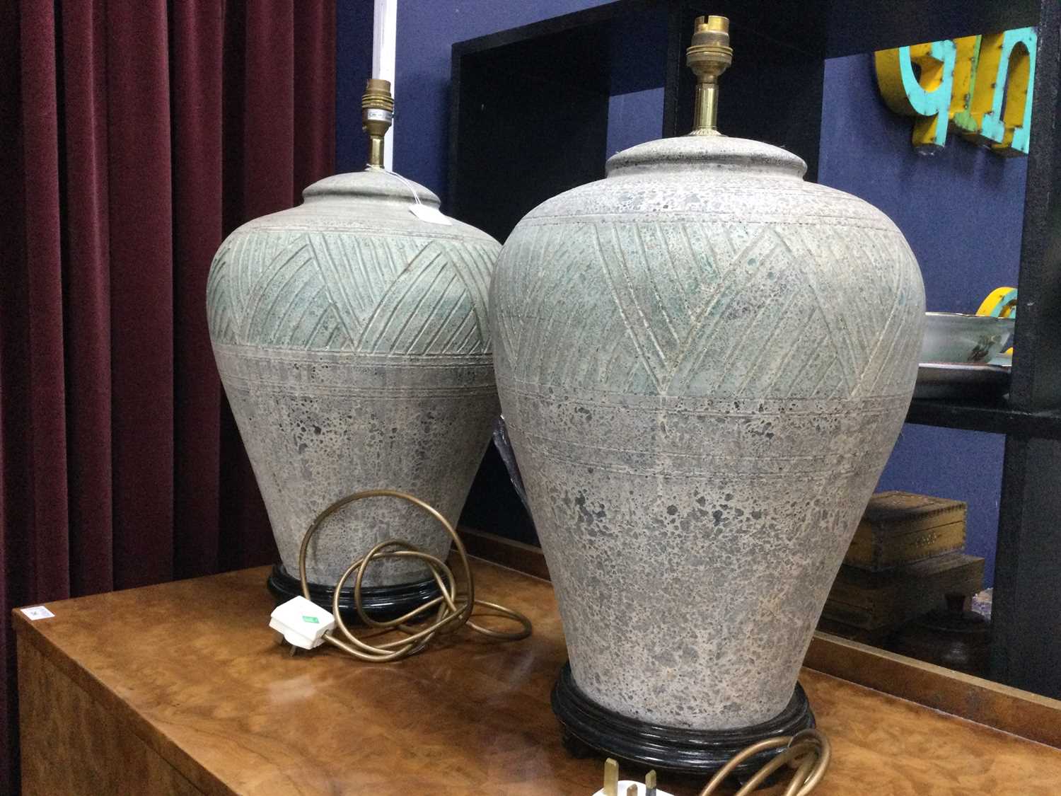 Lot 20 - A LARGE PAIR OF ARCHAIC STYLE LAMPS