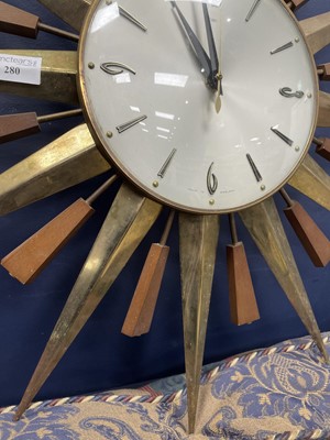 Lot 280 - A METAMEC SUNBURST WALL CLOCK