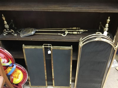 Lot 288 - A LOT OF TWO BRASS FOLDING FIRE GUARDS AND FIRE IRONS