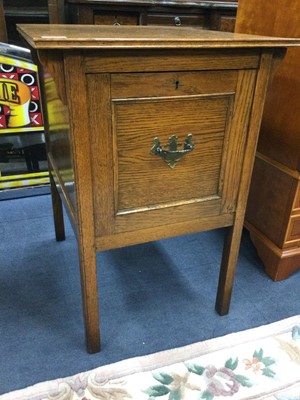 Lot 425 - AN OAK FILING CABINET