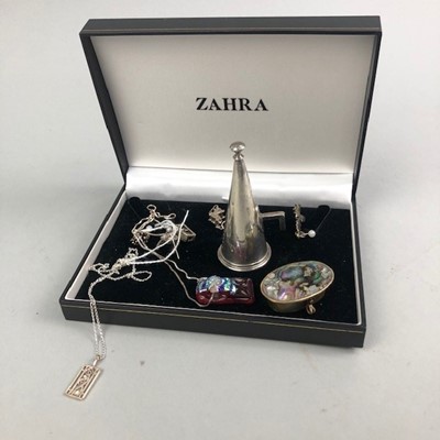 Lot 7 - A SILVER CANDLE SNUFFER AND SILVER CHARMS