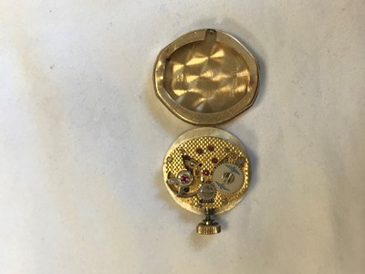 Lot 718 - A LADY'S ROTARY NINE CARAT GOLD WRIST WATCH AND PIN